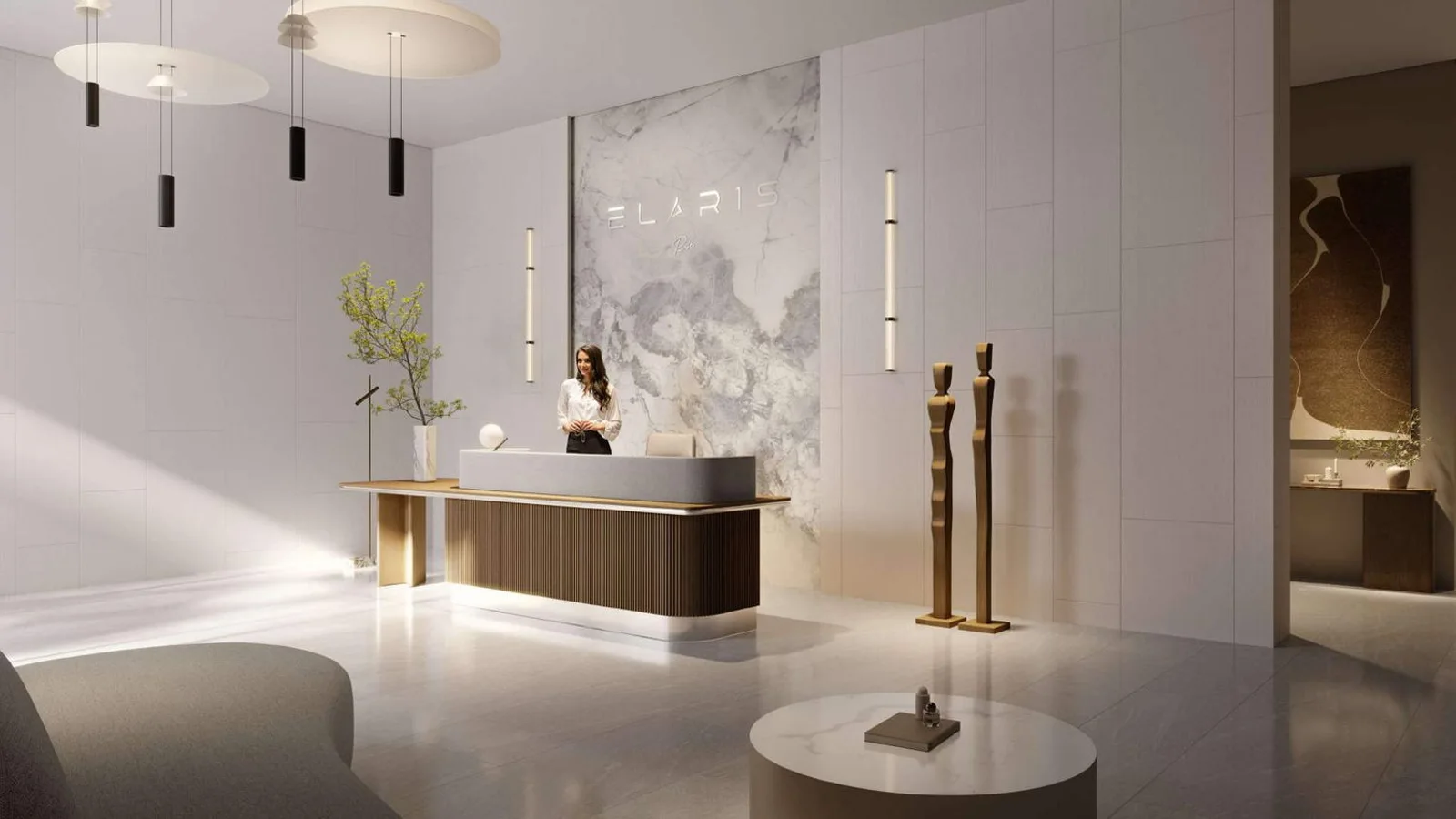 ELAR1S Rise reception lobby with a curved desk, pendant lights and a stone feature wall.
