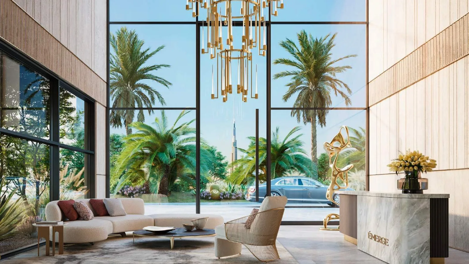 Émerge Residences double-height arrival lobby overlooking the landscaped pool courtyard