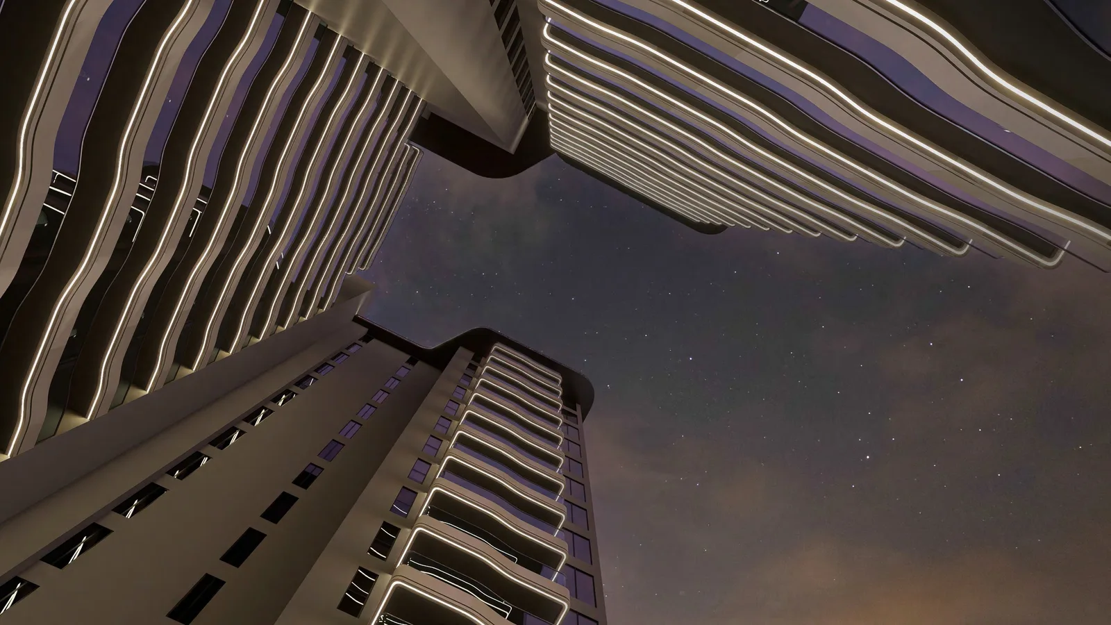 Reef 995 illuminated exterior and curved balconies at night