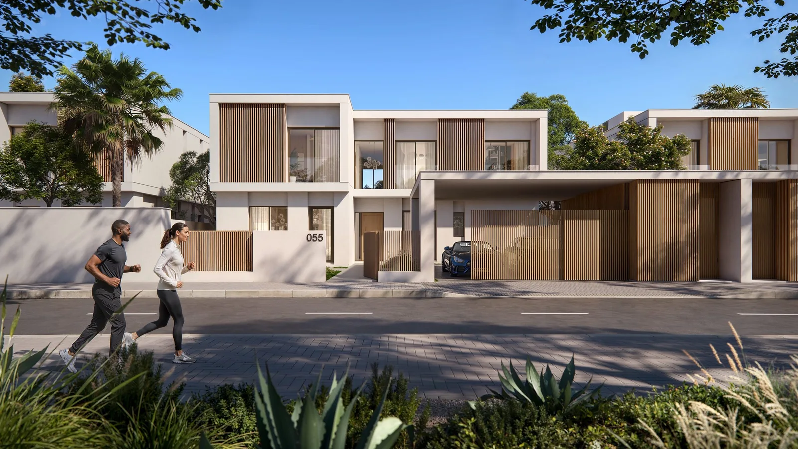Landscaped street and contemporary inland villas at Yas Riva Reserve.