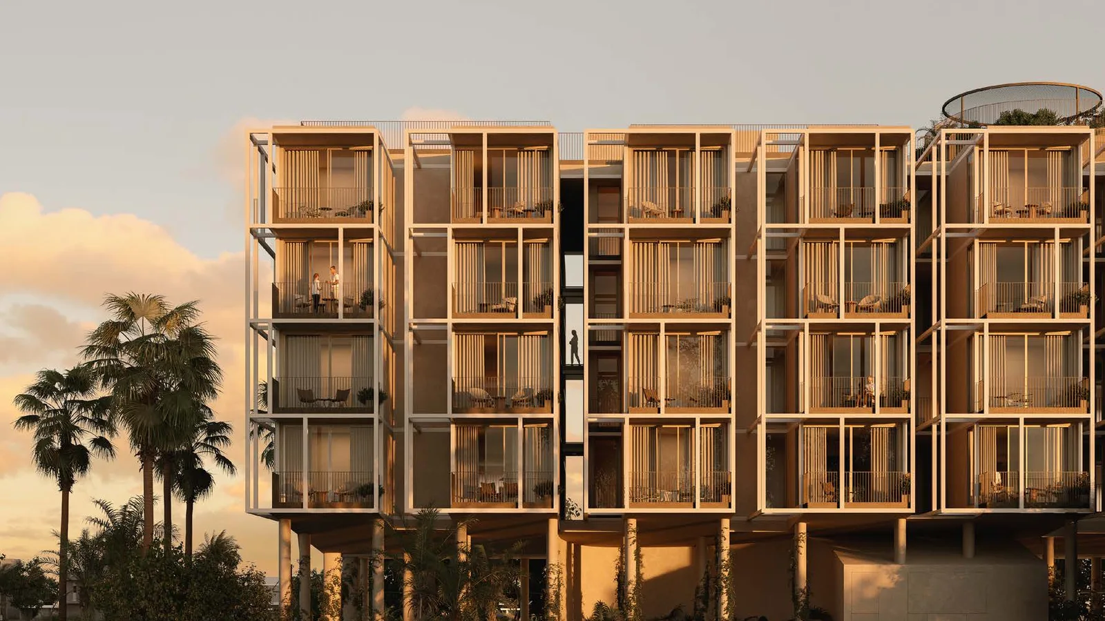 Low-rise façade with recessed balconies at sunset at Tessera by Al Ghurair.
