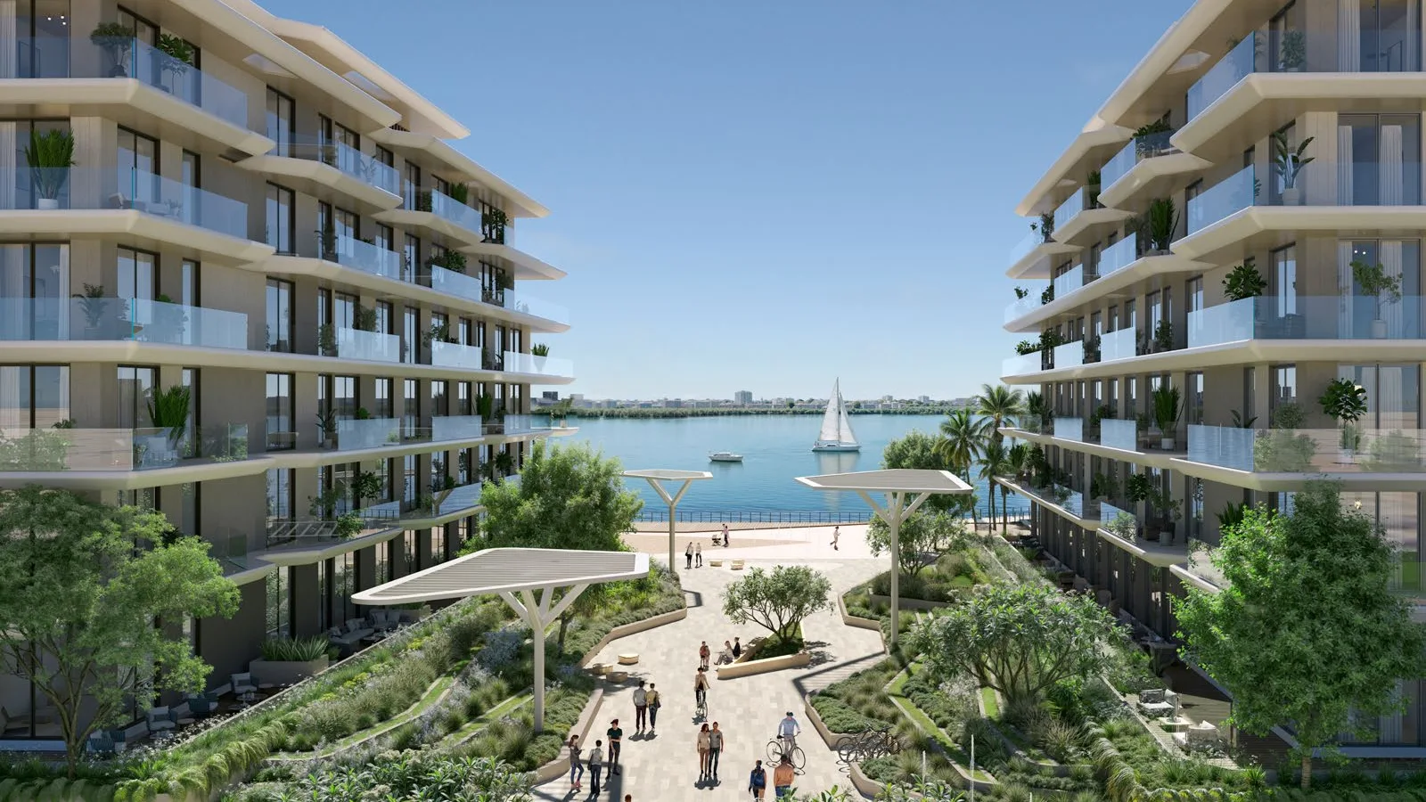 Landscaped pedestrian approach between the waterfront residence buildings at Bashayer Residences.
