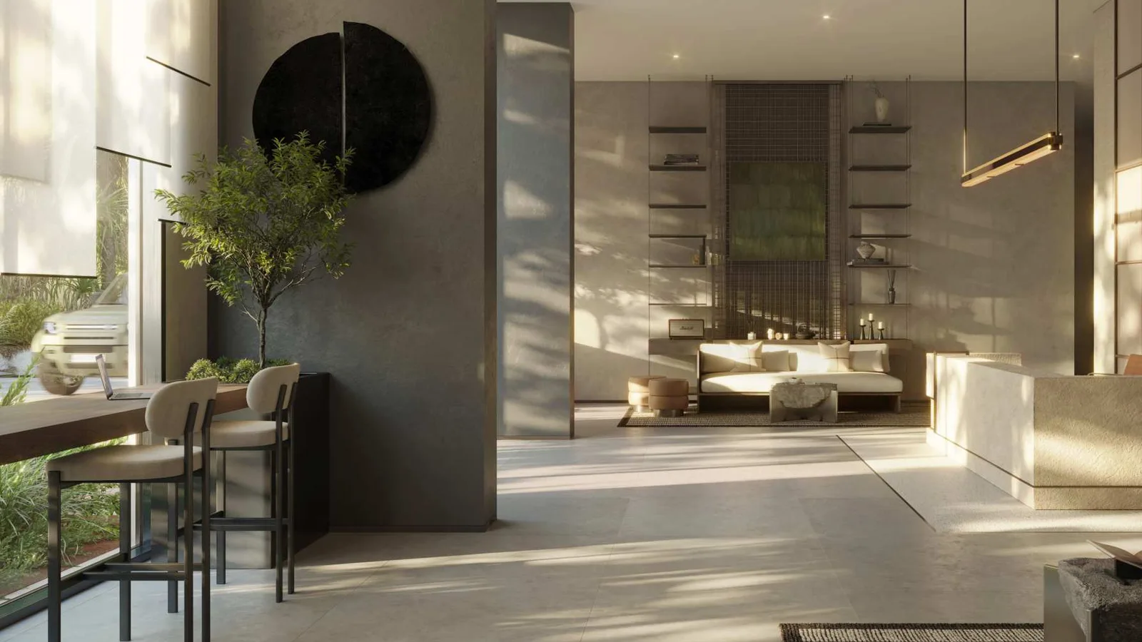 Sei Saadiyat lobby lounge with stone surfaces, seating and tall windows