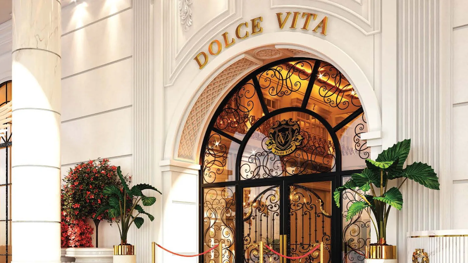 Vincitore Dolce Vita covered entrance and illuminated arrival court.