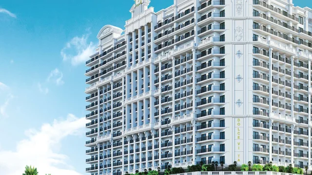 Vincitore Dolce Vita exterior with its sculpted facade, balconies and landscaped arrival area.